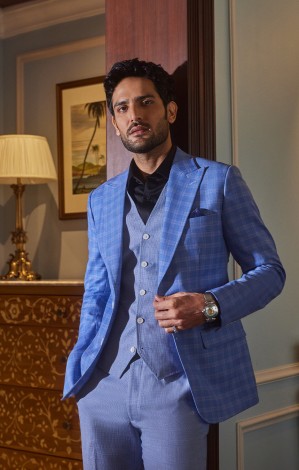 The Raymond Shop image featuring elegant formalwear and stylish men’s apparel