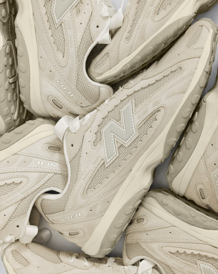 New Balance mobile banner showcasing running shoes, activewear and athletic essentials collection
