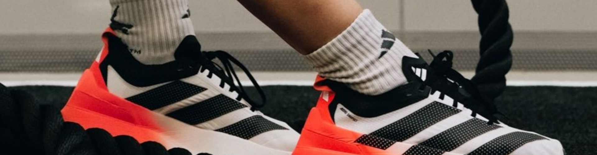 Adidas desktop banner highlighting performance sportswear and athletic footwear collection