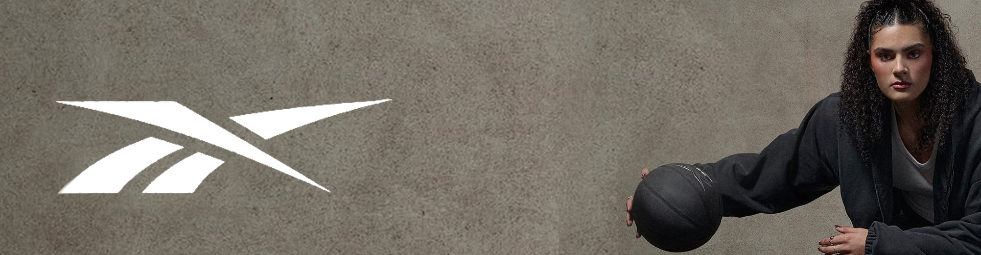 Reebok desktop banner highlighting sportswear and athletic footwear collection