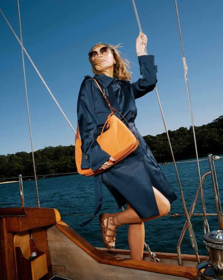 Michael Kors mobile banner showcasing designer handbags, watches and luxury fashion essentials collection
