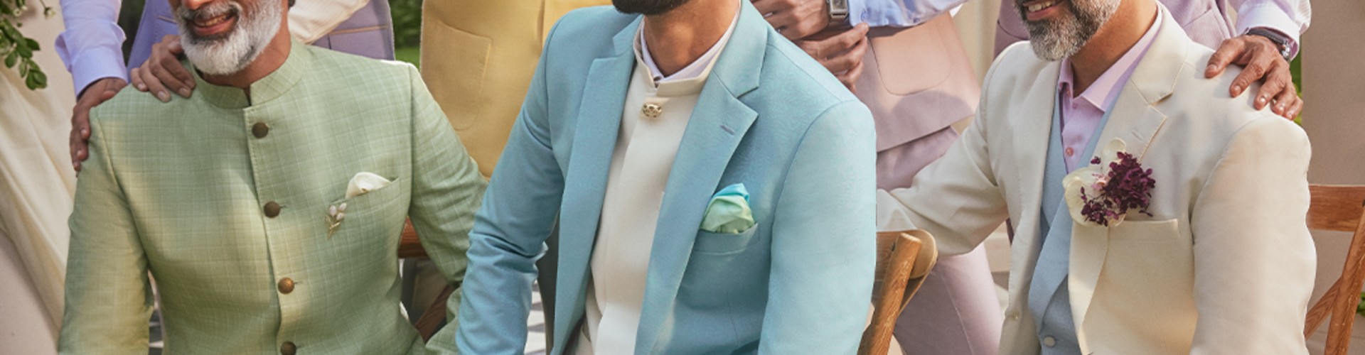 The Raymond Shop desktop banner highlighting premium suits and men’s formal fashion collection